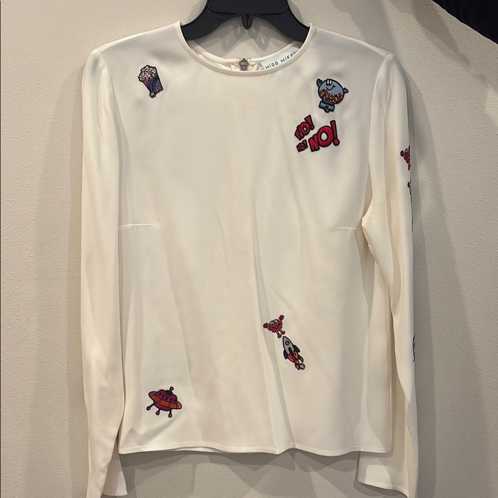 Mira Mikati White Top with Colorful Cartoon Patches